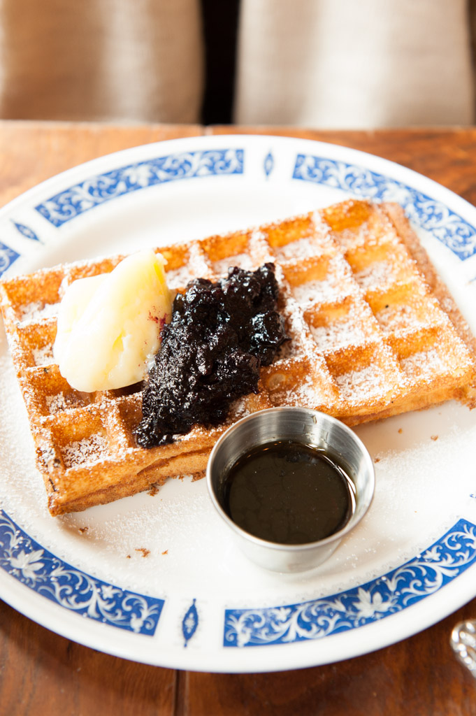 Waffle with blueberry jam and honey butter